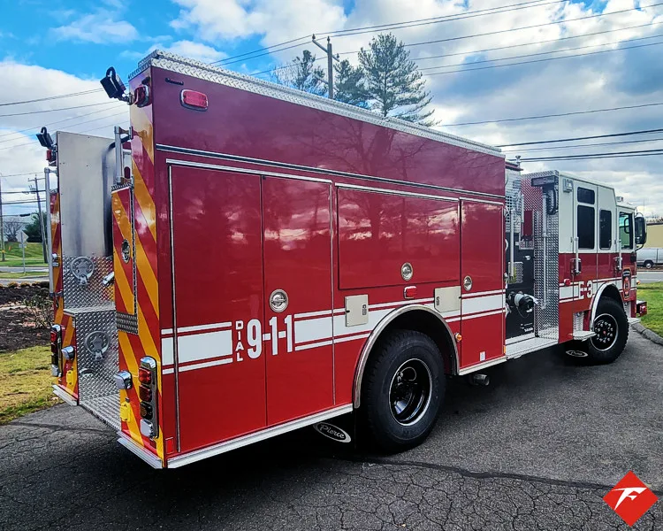 Rear-right exterior view showing side body and rear chevrons