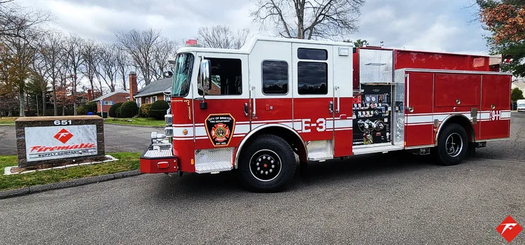 Pumper front-left exterior profile showing full side body and cab