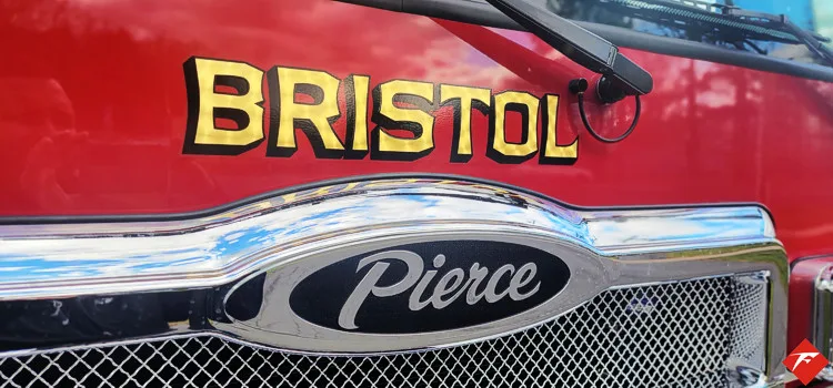 Front grille close-up showing Bristol script and Pierce badge