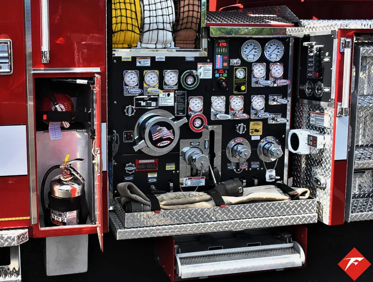 Pump panel close-up showing gauges, valves, and intake controls