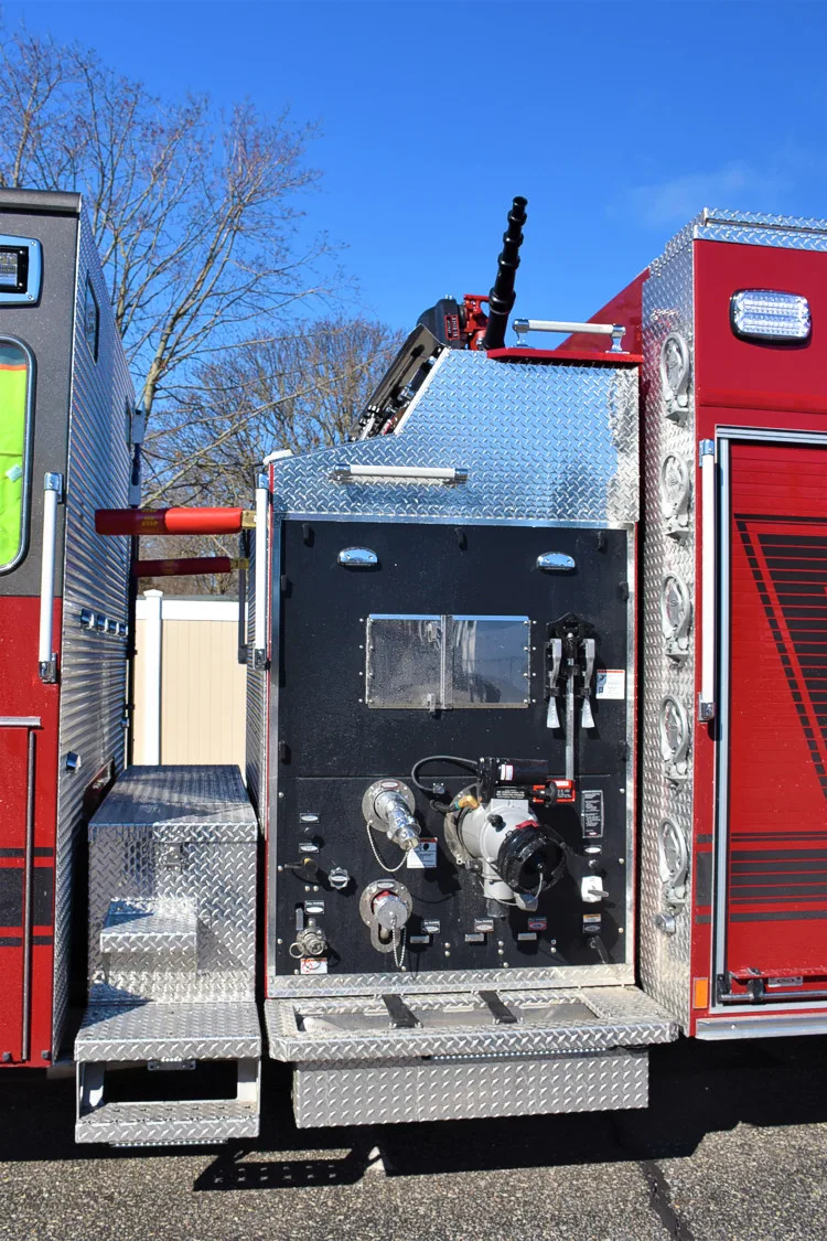 Rear-side compartment view with door open showing storage bay and equipment area