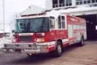 Rescue truck front-left exterior view showing enclosed cab and long body