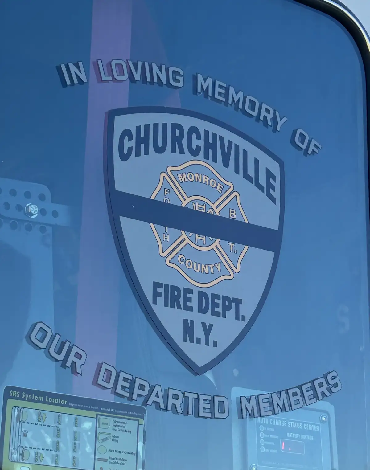 Cab window memorial decal close-up on tinted side glass