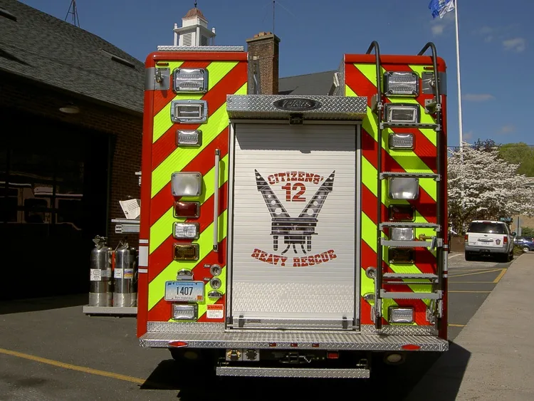 Rear view showing chevrons and centered company panel