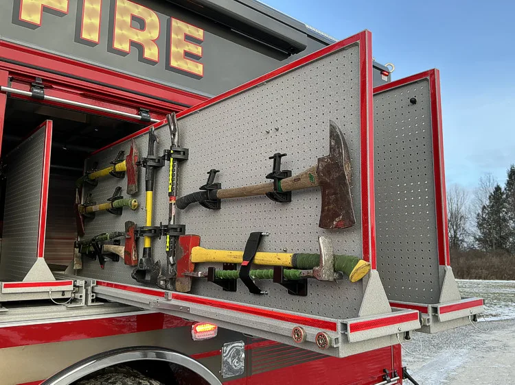 Driver-side profile with open compartments and equipment bays