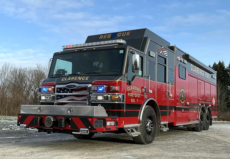Front-left exterior view in low light with aerial boom nested