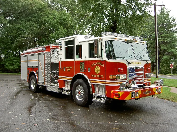Front-right exterior view showing grille, bumper, and side body