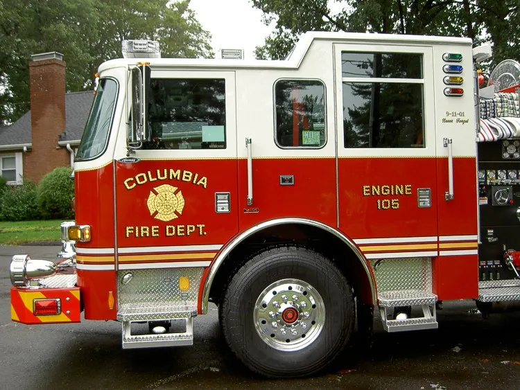 Cab side close-up showing front door, side window, and wheel area