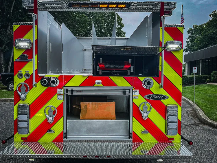 Rear view showing chevron panel and open rear center storage area