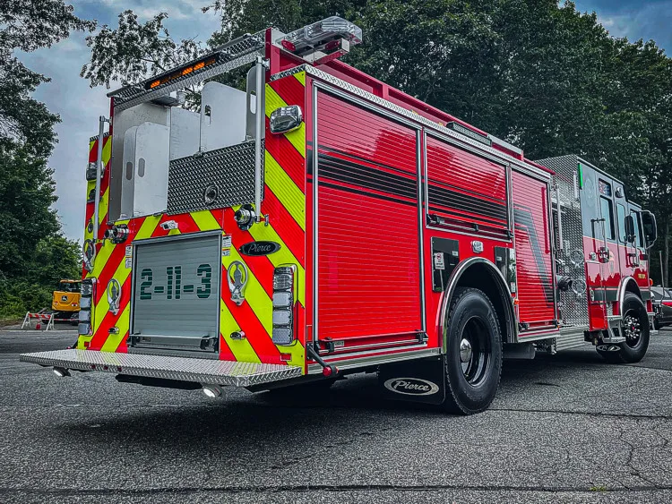 Rear-right exterior view showing side body and open rear-facing area