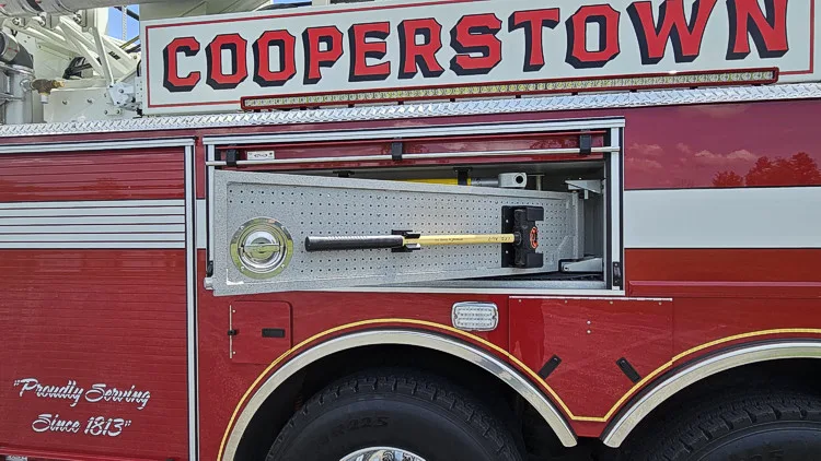 Side body close-up showing raised script and ladder base section