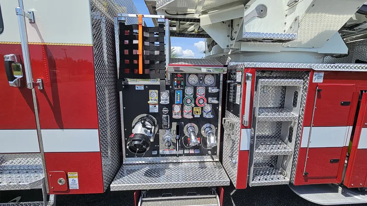 Pump panel close-up showing gauges, valves, and intake controls