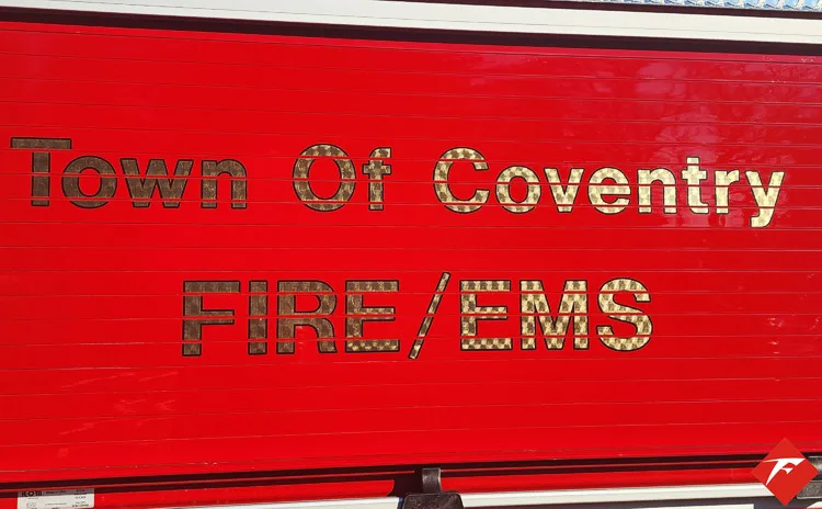 Body side lettering close-up reading town fire and EMS designation
