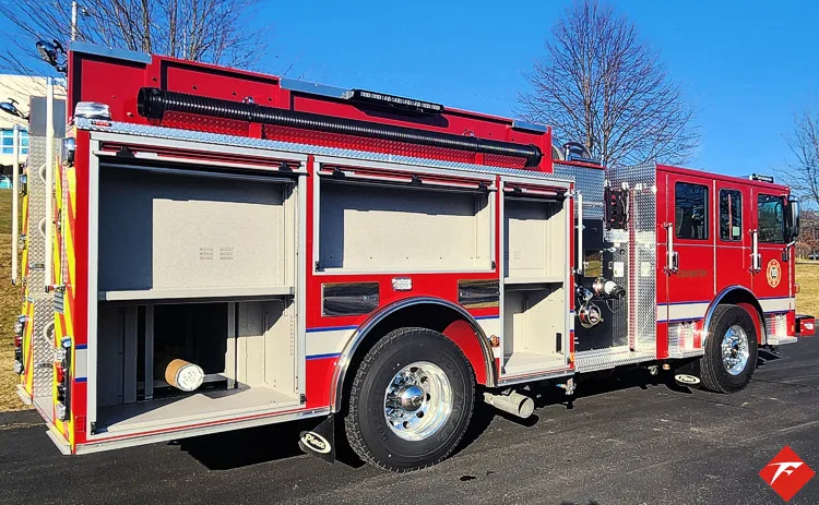 Driver-side profile with open compartments showing storage bays