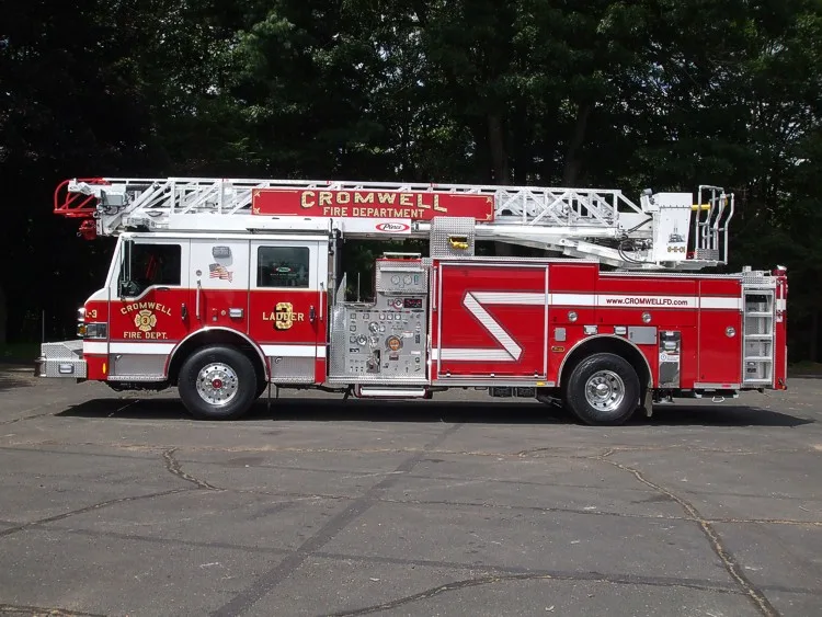 Driver-side full profile showing ladder sections and side compartments