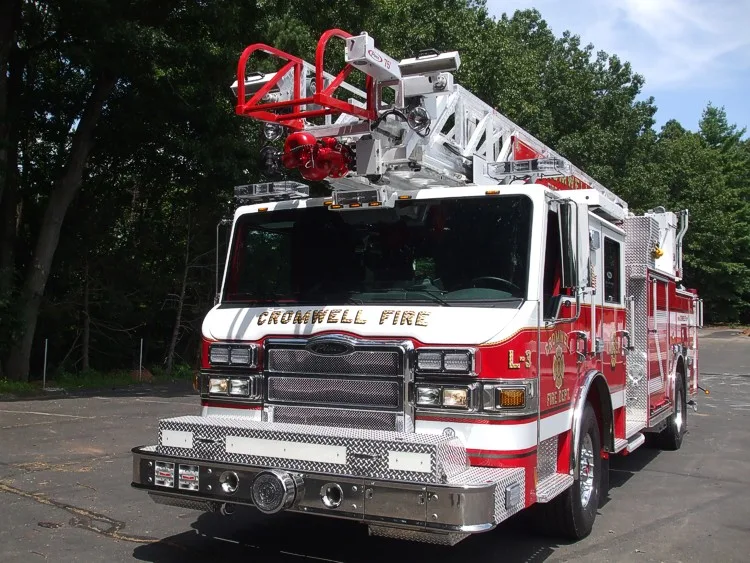 Front-right exterior view showing bumper, cab, and ladder tip