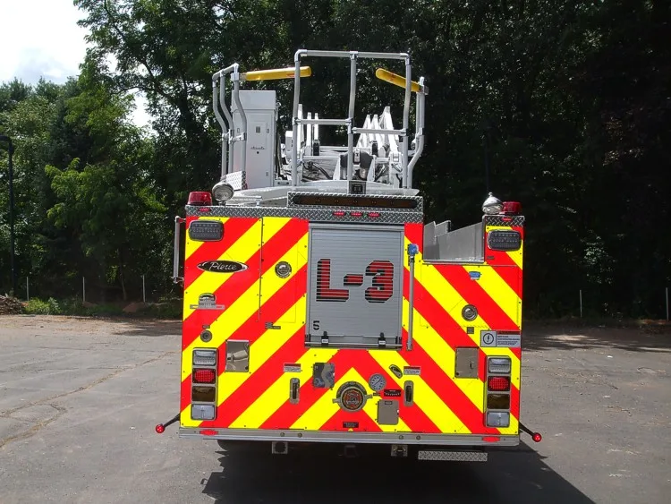 Rear view showing rear panel, warning chevrons, and platform base