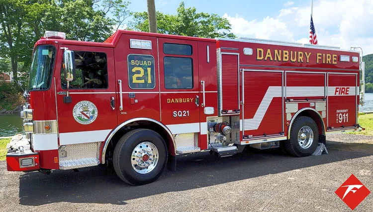 Rescue pumper side profile view showing full body and wheelbase