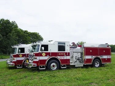 Two-pumper side view showing driver-side profiles and pump panel areas