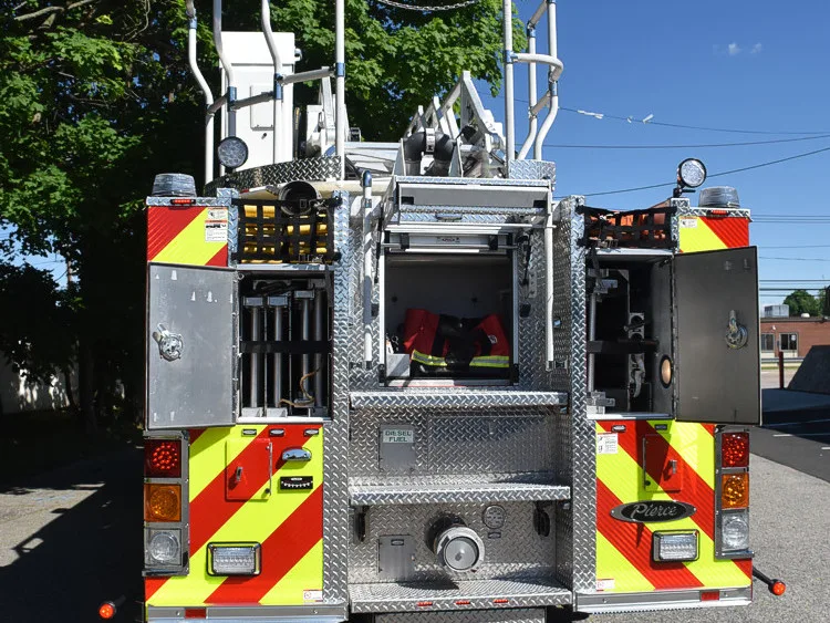 Rear view showing chevrons, stabilizer section, and ladder base area