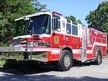 Wide front-left thumbnail view of the rescue pumper parked roadside.