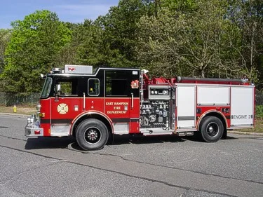 Passenger-side cab close-up showing side window and rear wheel area