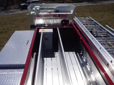 Top deck view showing hosebed channels and side ladders