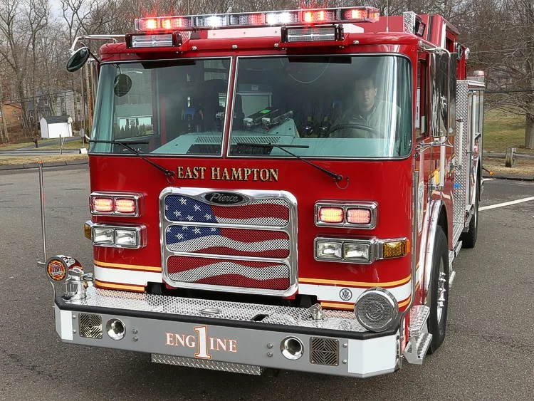 Front-right exterior view showing bumper, cab, and side body