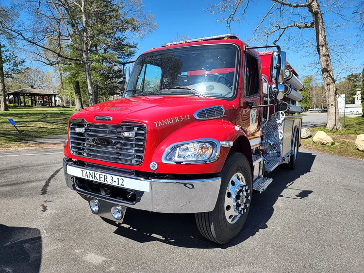 Head-on front view showing grille and front bumper intake ports