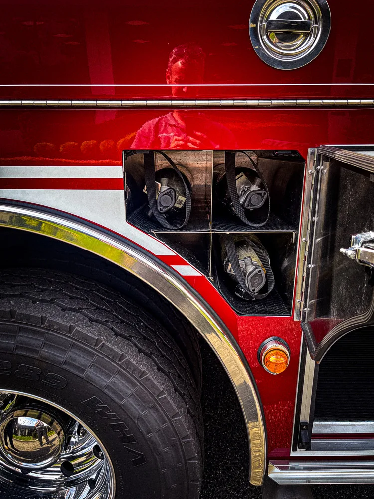 Wheel-area close-up showing side marker light and lower body panel