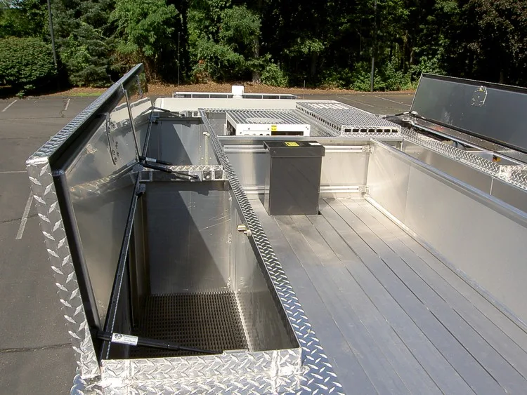 Hosebed top view showing open bed compartment and aluminum deck panels
