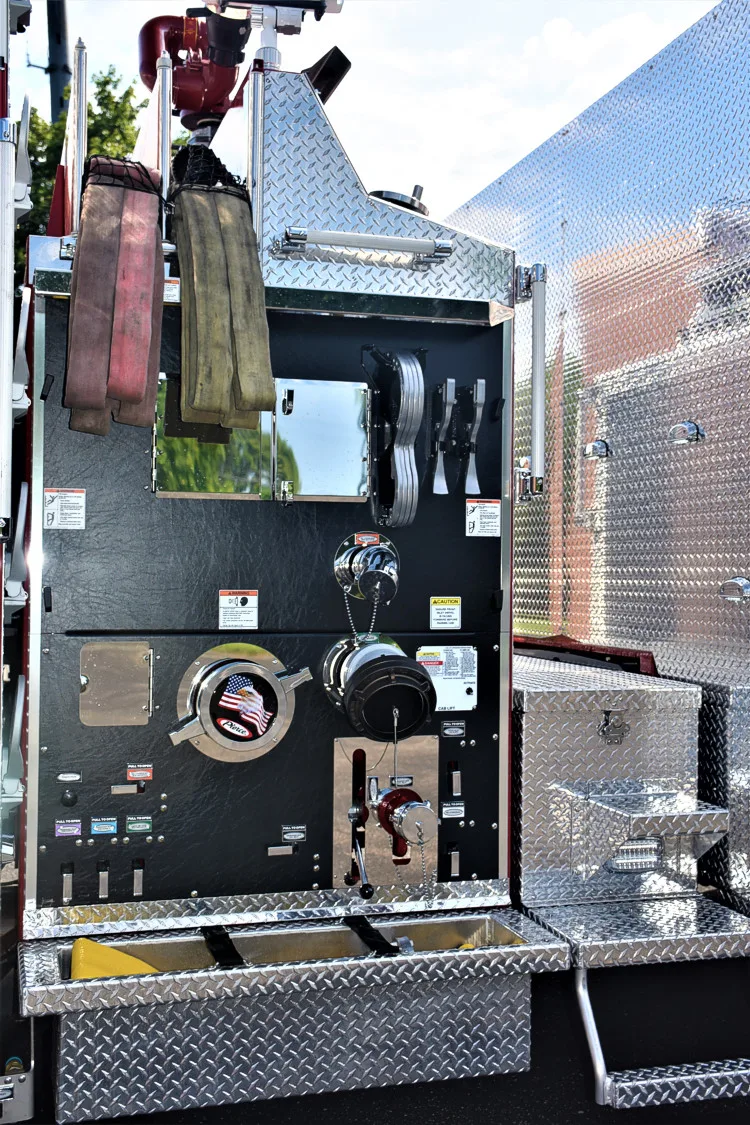 Open pump-side panel showing intake controls and fittings