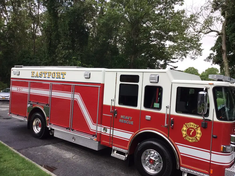 Officer-side profile view showing cab, wheel area, and side body