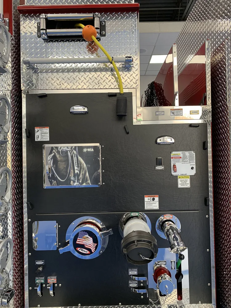 Pump-side intake panel close-up showing large ports and valve handles