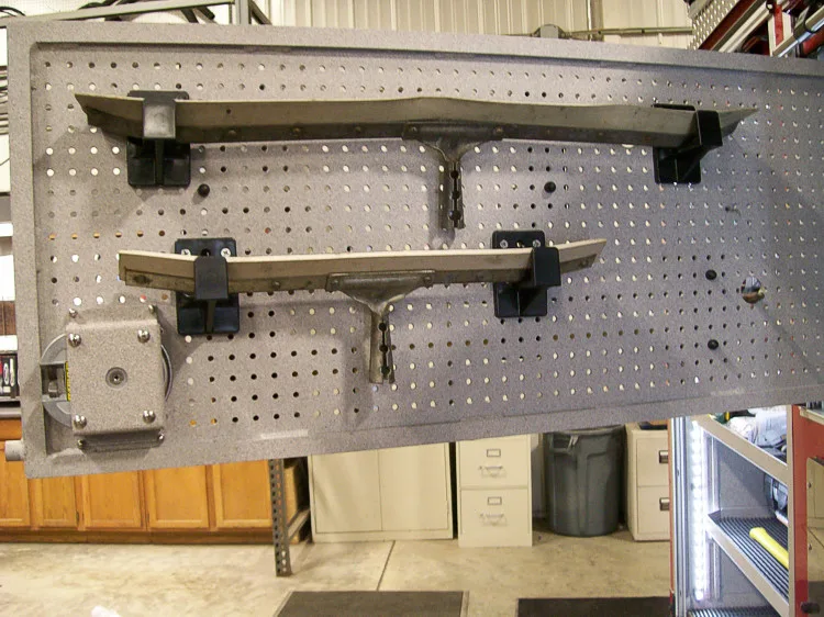 Open compartment close-up showing tool brackets and mounting hardware