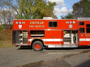 Mid-body compartment view showing open shelving and side storage layout