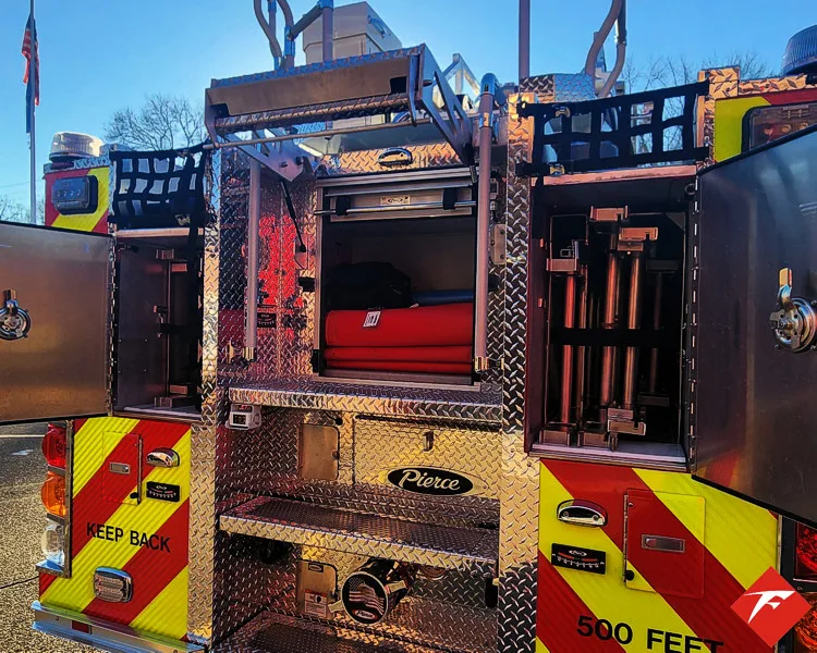 Open rear compartment showing slide-out tray and rear chevron panel