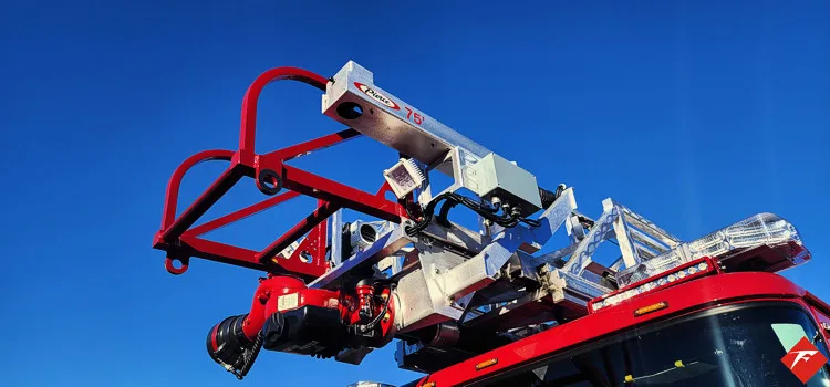 Ladder tip close-up showing red bucket framework and ladder sections
