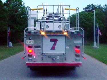 Rear view showing rear platform structure and warning lights