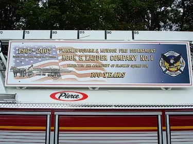 Side panel close-up showing anniversary banner graphics and text