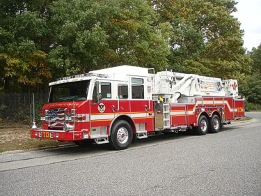 Front-right exterior view showing cab and ladder sections