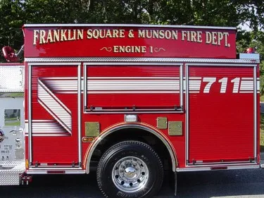 Body side close-up showing station lettering and unit number