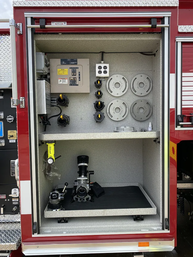 Open side control compartment showing pump controls and intake hardware
