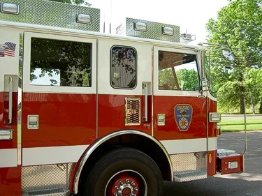 Driver-side cab section close-up showing front door and side window layout