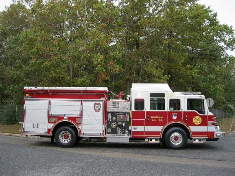 Passenger-side full profile showing pump panel controls, side compartments, and wheel/tire layout.