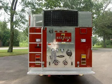 Rear view showing rear intake connections, warning lights, and upper hosebed area