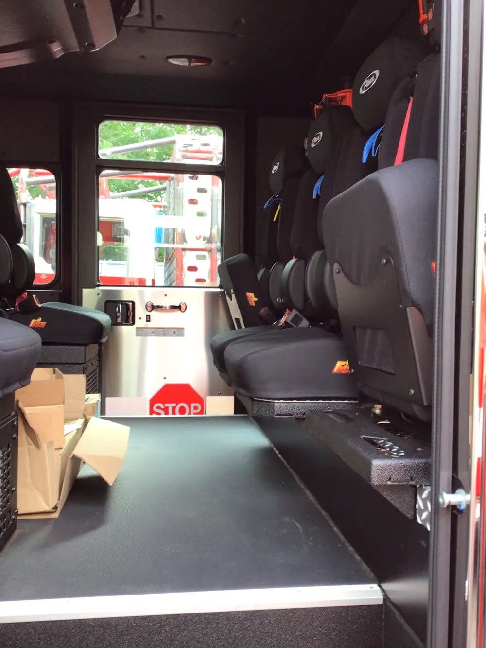 Rear crew seating view showing SCBA seats and center aisle