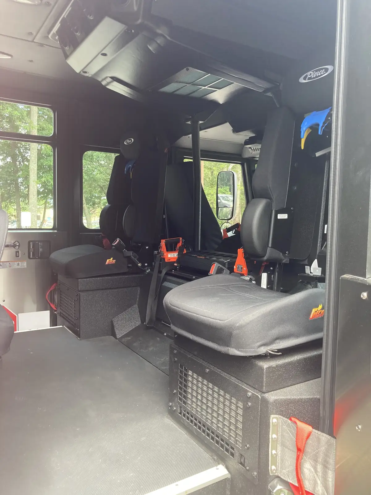 SCBA seat mount close-up behind crew seat back