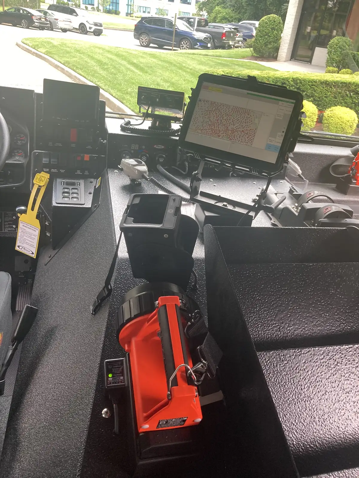 Seat fabric close-up with Fire Fighter logo patch