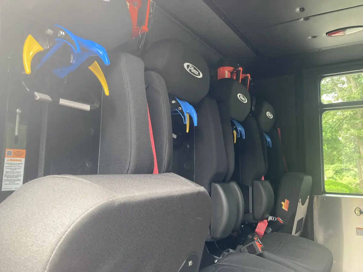 Floor-mounted control buttons close-up for air horn and mechanical functions